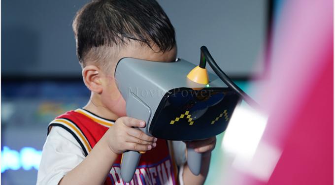 La maniglia sottomarina di avventura della macchina del gioco di realtà virtuale dei bambini ha tenuto il casco di VR 1